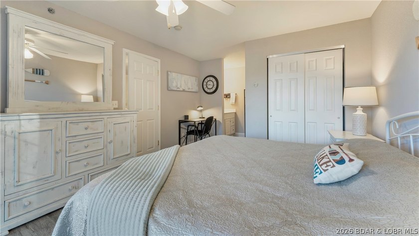 Wake up to peaceful cove views from your screened deck at this - photo 10