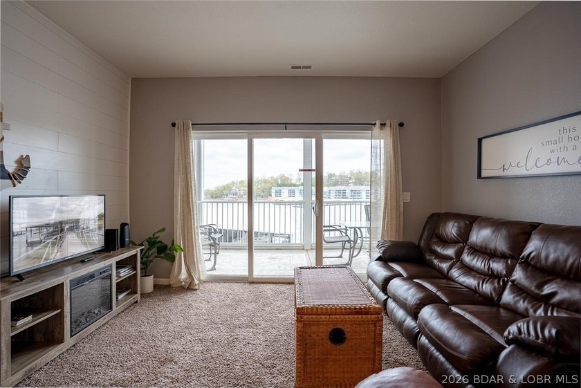 Wake up to the lake every single morning! This stunning - photo 5
