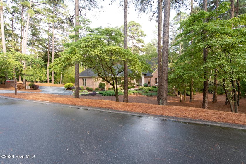 Privately nestled within the Gates of Pinewild Country Club of - photo 3