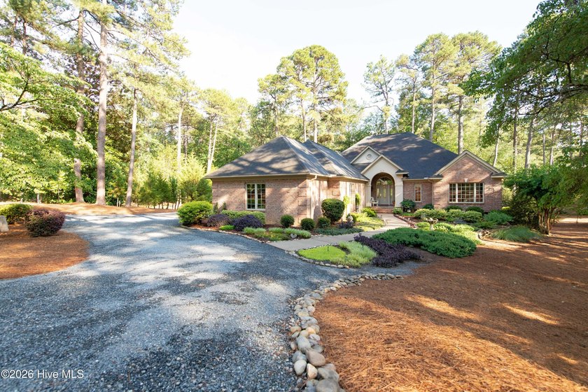 Privately nestled within the Gates of Pinewild Country Club of - photo 4