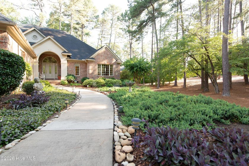 Privately nestled within the Gates of Pinewild Country Club of - photo 6