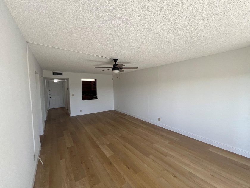 Top floor, corner unit.. Enclosed balcony with brand new Impact - photo 19