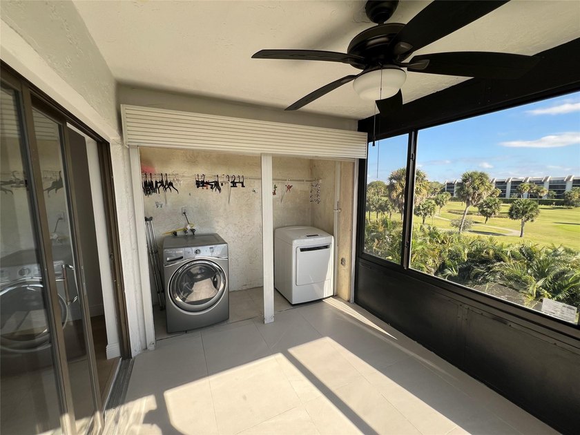 Top floor, corner unit.. Enclosed balcony with brand new Impact - photo 22
