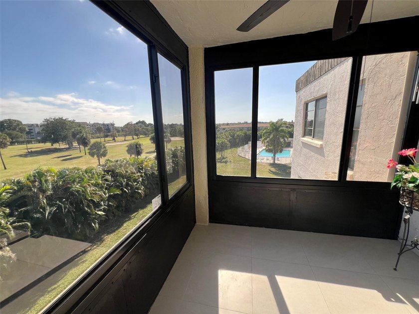 Top floor, corner unit.. Enclosed balcony with brand new Impact - photo 25