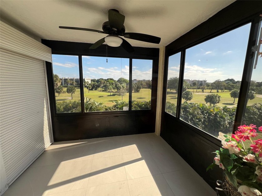 Top floor, corner unit.. Enclosed balcony with brand new Impact - photo 27