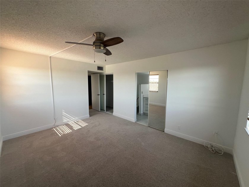 Top floor, corner unit.. Enclosed balcony with brand new Impact - photo 30