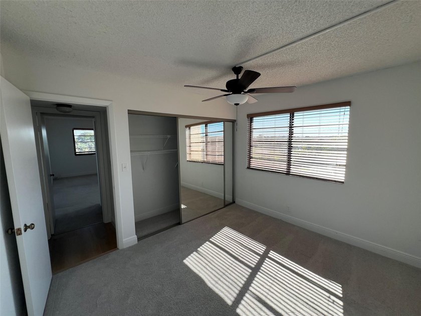 Top floor, corner unit.. Enclosed balcony with brand new Impact - photo 33