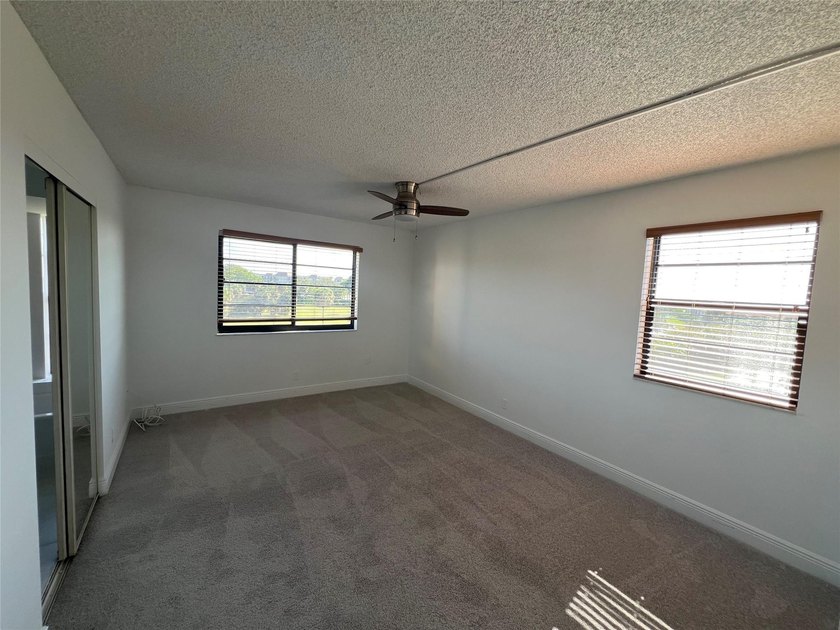 Top floor, corner unit.. Enclosed balcony with brand new Impact - photo 35