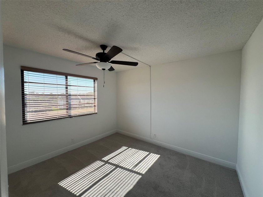 Top floor, corner unit.. Enclosed balcony with brand new Impact - photo 36
