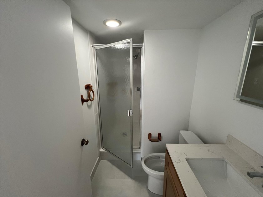 Top floor, corner unit.. Enclosed balcony with brand new Impact - photo 37
