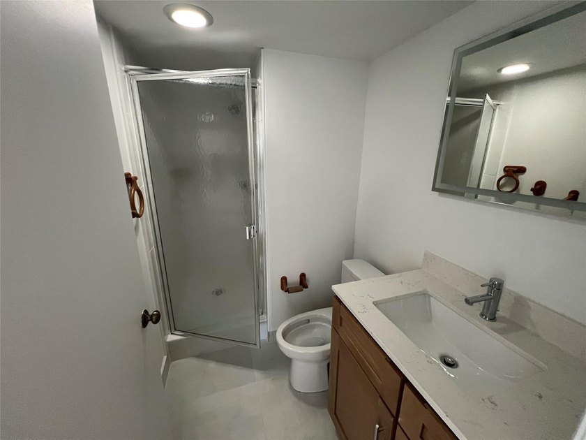 Top floor, corner unit.. Enclosed balcony with brand new Impact - photo 38