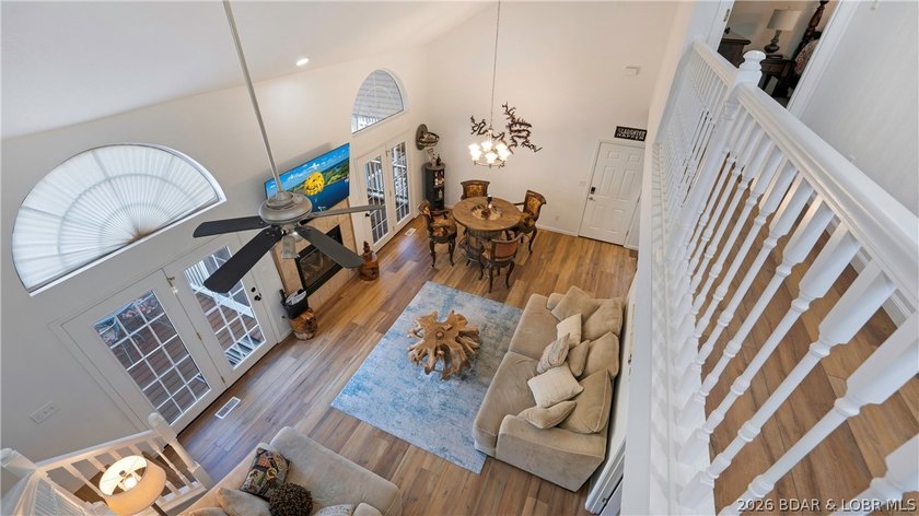 Welcome to easy lake living with this 5 bedroom, 3.5 bath home - photo 2