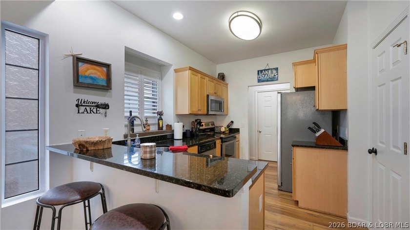 Welcome to easy lake living with this 5 bedroom, 3.5 bath home - photo 7