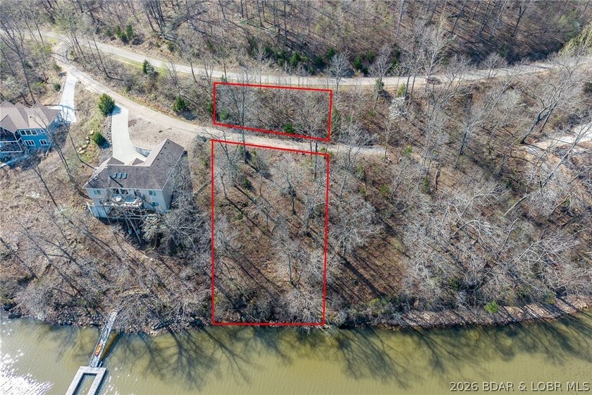 Lake Front lot ready for your dream home build! Located at the - photo 2