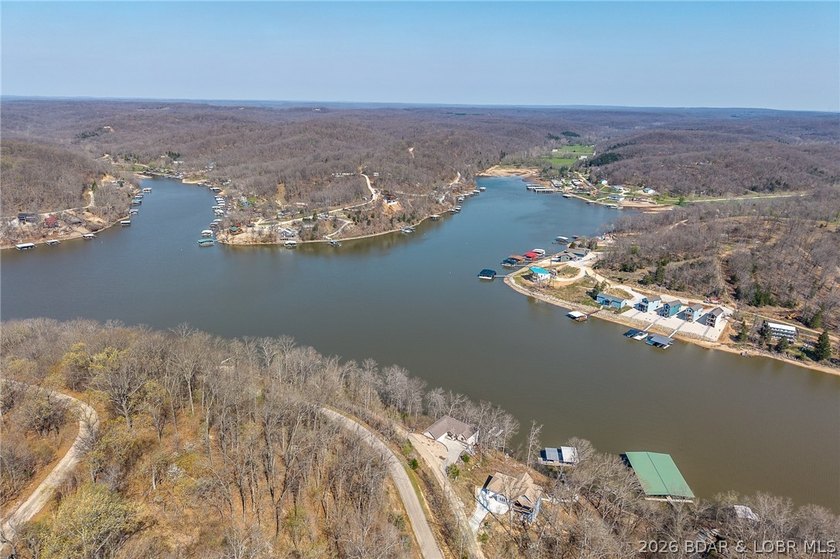 Lake Front lot ready for your dream home build! Located at the - photo 9