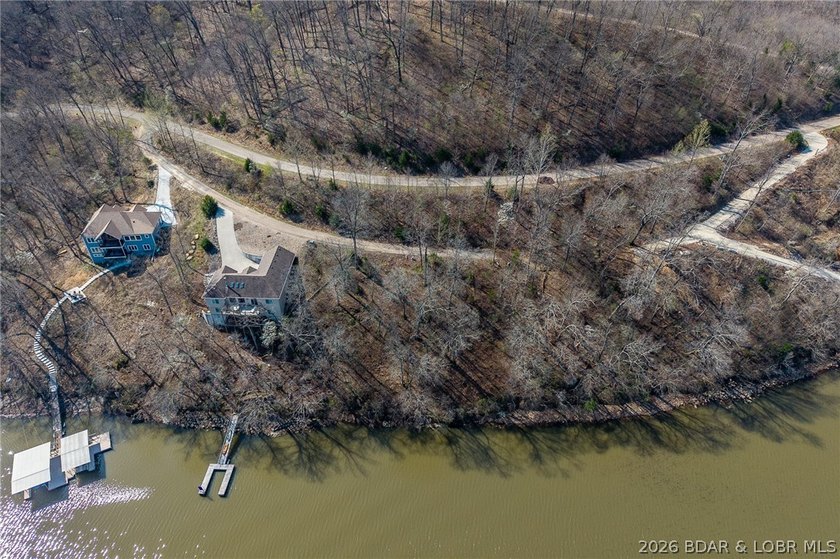 Lake Front lot ready for your dream home build! Located at the - photo 10