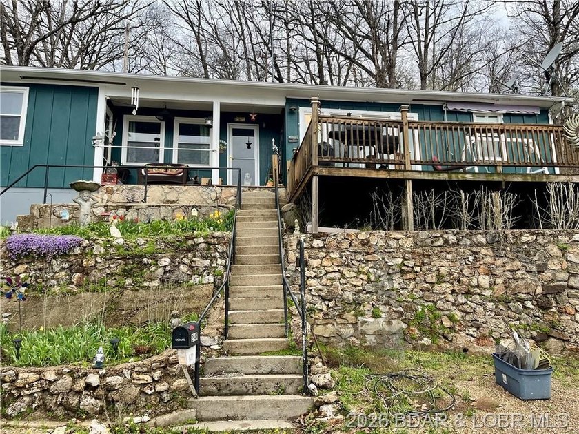 Lake of the Ozarks waterfront property featuring natural stone - photo 3
