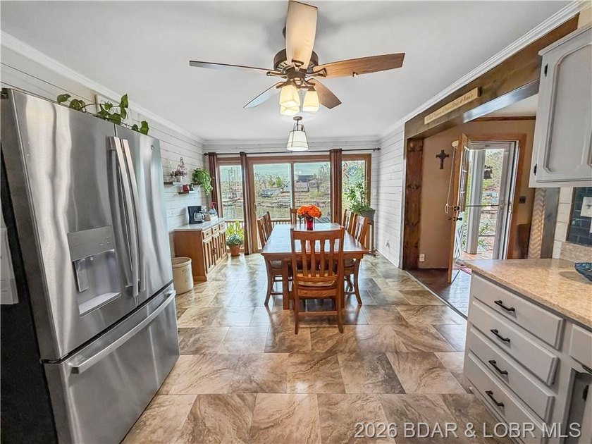 Lake of the Ozarks waterfront property featuring natural stone - photo 6