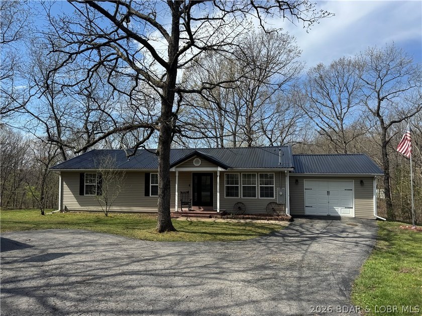 Set on nearly 5 acres, this property offers the rare blend of - photo 3