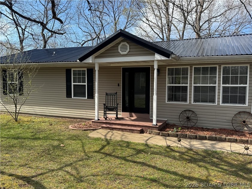 Set on nearly 5 acres, this property offers the rare blend of - photo 4