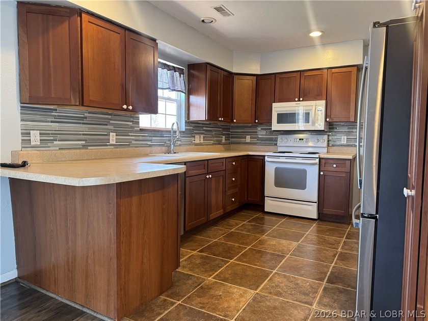 Set on nearly 5 acres, this property offers the rare blend of - photo 9