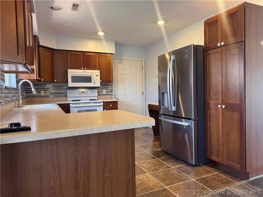 Set on nearly 5 acres, this property offers the rare blend of - photo 10