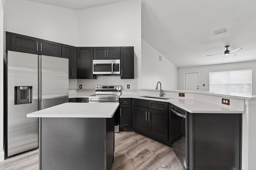 Move-in-ready, home appraised at $416K. This fabulous updated - photo 14