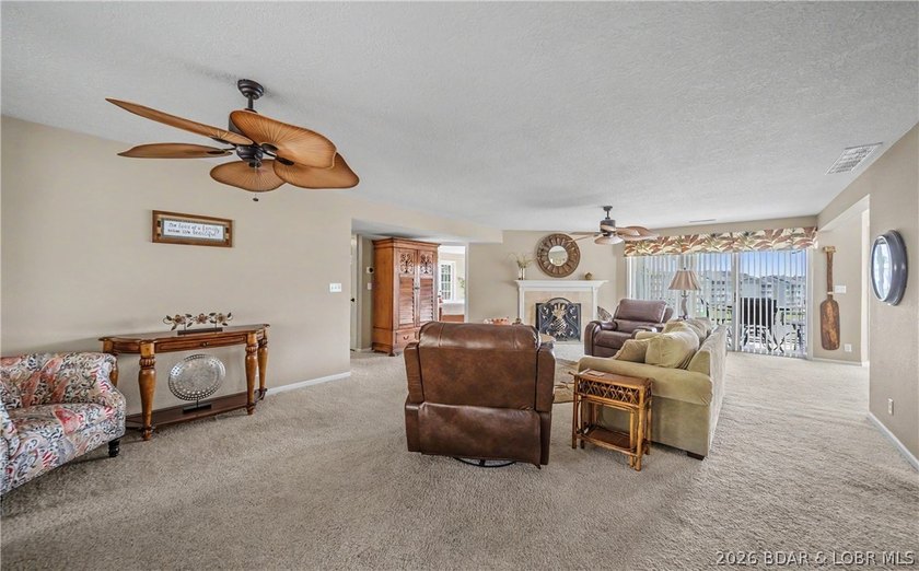 Enjoy stunning lake views from your screened-in deck overlooking - photo 3