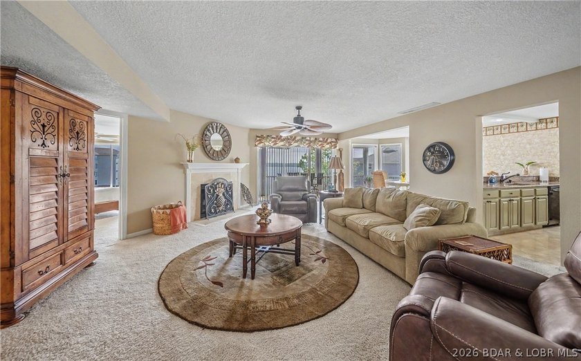 Enjoy stunning lake views from your screened-in deck overlooking - photo 4