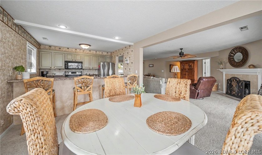 Enjoy stunning lake views from your screened-in deck overlooking - photo 8