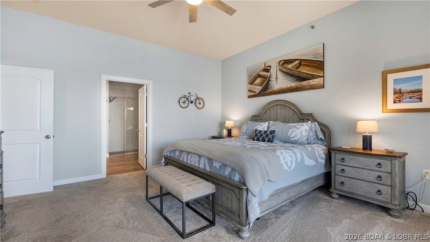 Experience refined lakefront living in this fully updated - photo 12