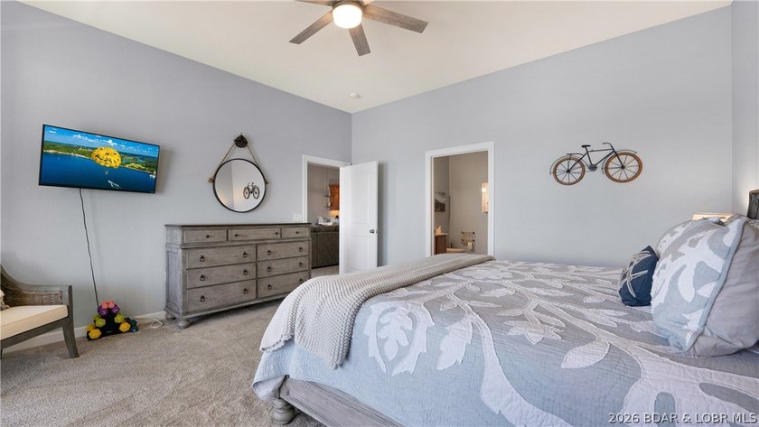 Experience refined lakefront living in this fully updated - photo 13