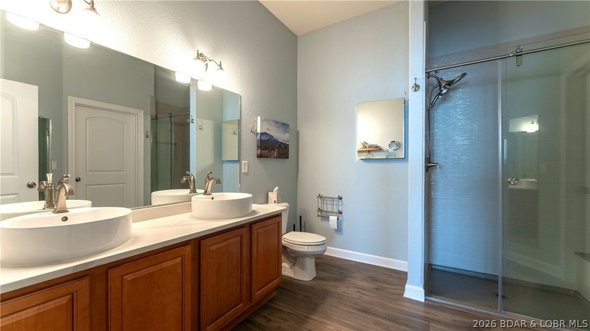 Experience refined lakefront living in this fully updated - photo 14