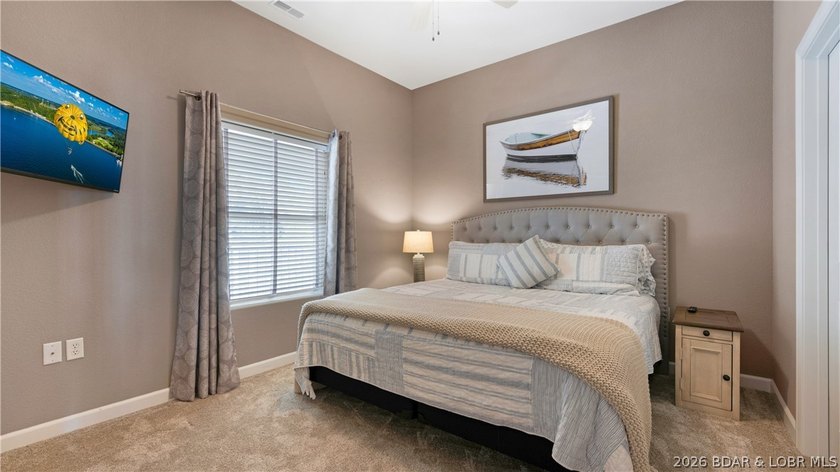 Experience refined lakefront living in this fully updated - photo 16