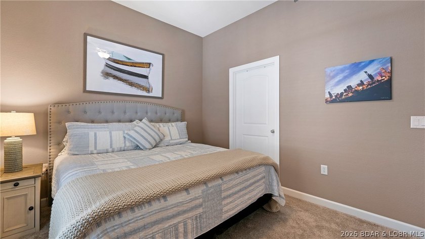 Experience refined lakefront living in this fully updated - photo 17