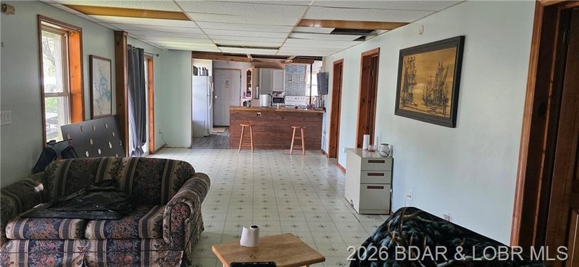 Large lakefront family home tucked back in a protective cove for - photo 7