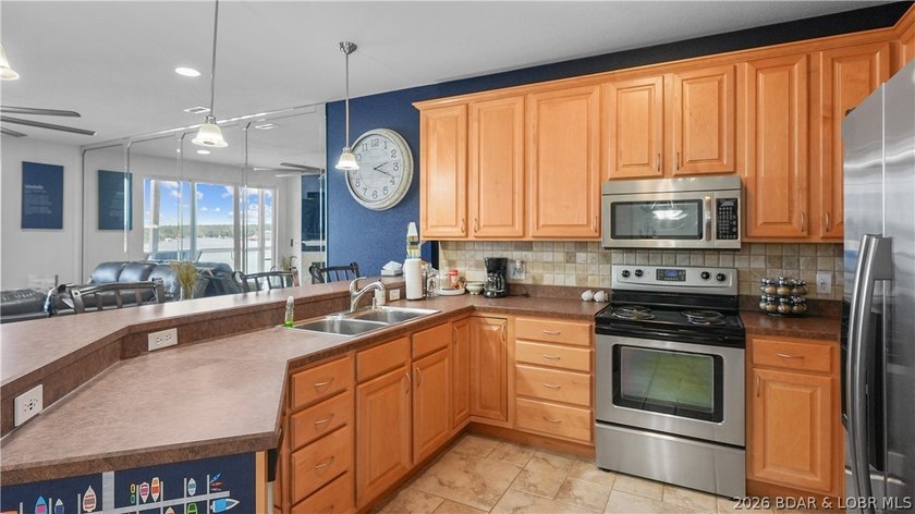 Right in the heart of Osage Beach, this Lands' End condo puts - photo 9