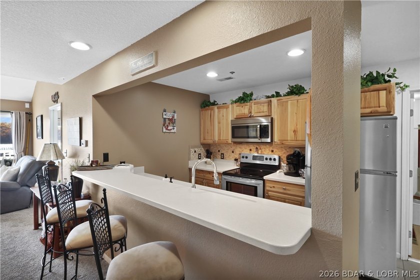 Top-floor, two-story lakefront living in the heart of Osage - photo 9