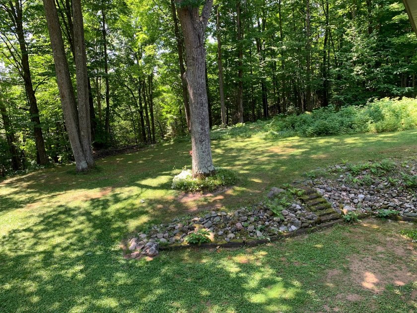 This 3 bedroom, 2 bath home is located in a parklike setting on - photo 15