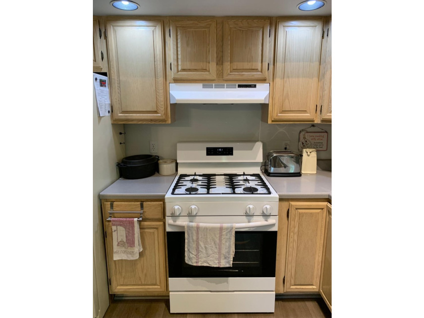 This 3 bedroom, 2 bath home is located in a parklike setting on - photo 17