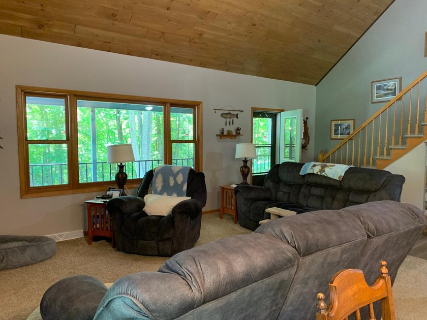 This 3 bedroom, 2 bath home is located in a parklike setting on - photo 21