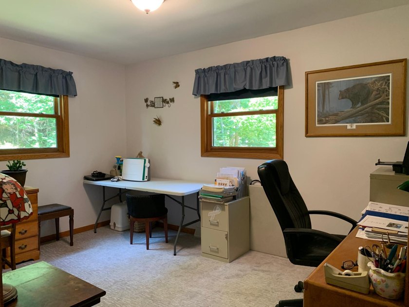 This 3 bedroom, 2 bath home is located in a parklike setting on - photo 23