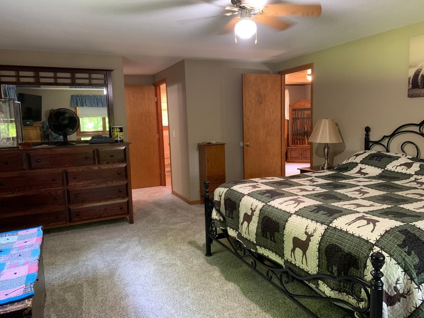 This 3 bedroom, 2 bath home is located in a parklike setting on - photo 34