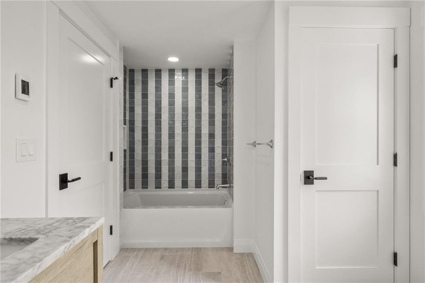 Beautifully transformed from top to bottom, this exceptional - photo 34