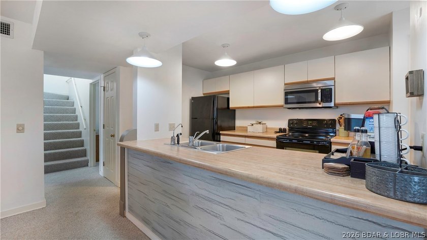 Enjoy lake front living at this multi-level and spacious 1,758 - photo 9