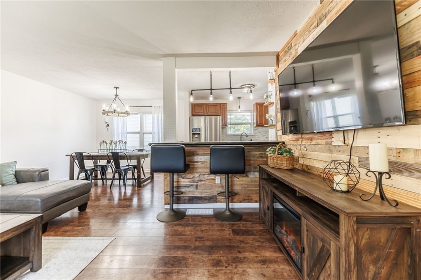 You'll feel right at home in this charming home which offers - photo 10