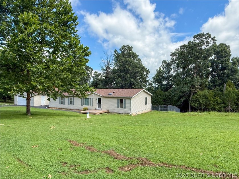Enjoy privacy, space and a convenient location with this 3 - photo 22