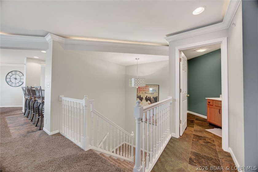 This stunning 2-level condo at Regatta Bay is everything a lake - photo 8
