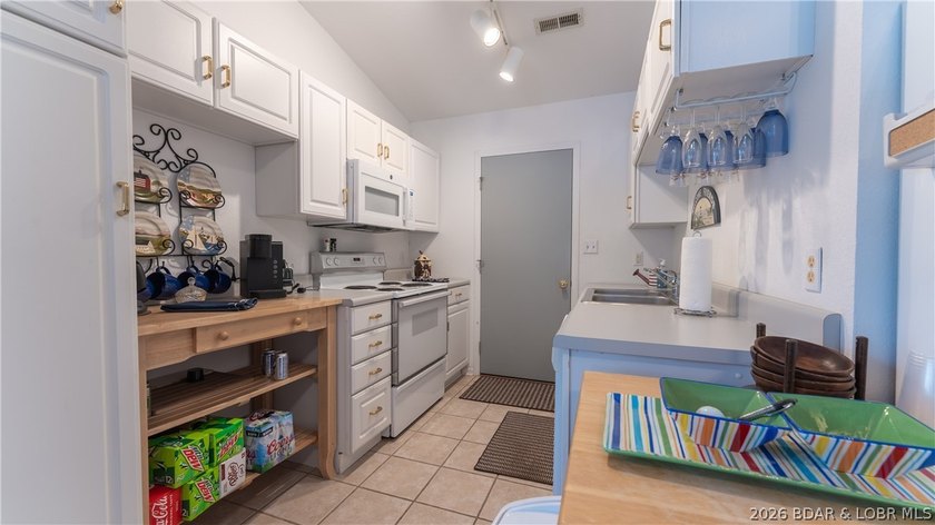Don't miss this beautiful 3 bedroom, 2 bath waterfront home - photo 7