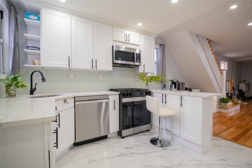 Welcome to this beautifully renovated single-family home located - photo 6
